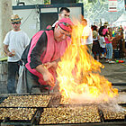 El foc a la cuina del caragol a la llauna