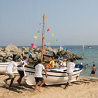 Posant les barques a mar