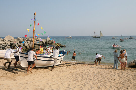 Posant les barques a mar